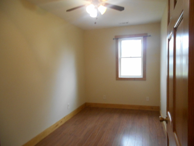 304 South Columbus Street Ransom, IL 60470 - Photo 8 of 24 an empty room with a window