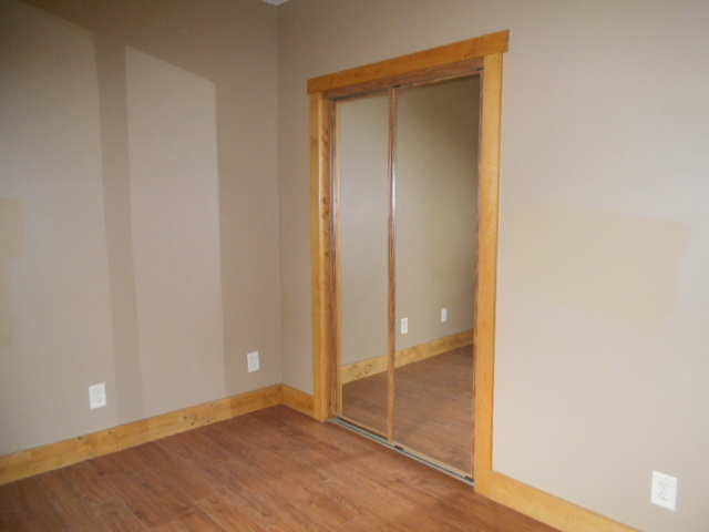 304 South Columbus Street Ransom, IL 60470 - Photo 10 of 24 a view of an empty room with wooden floor and closet