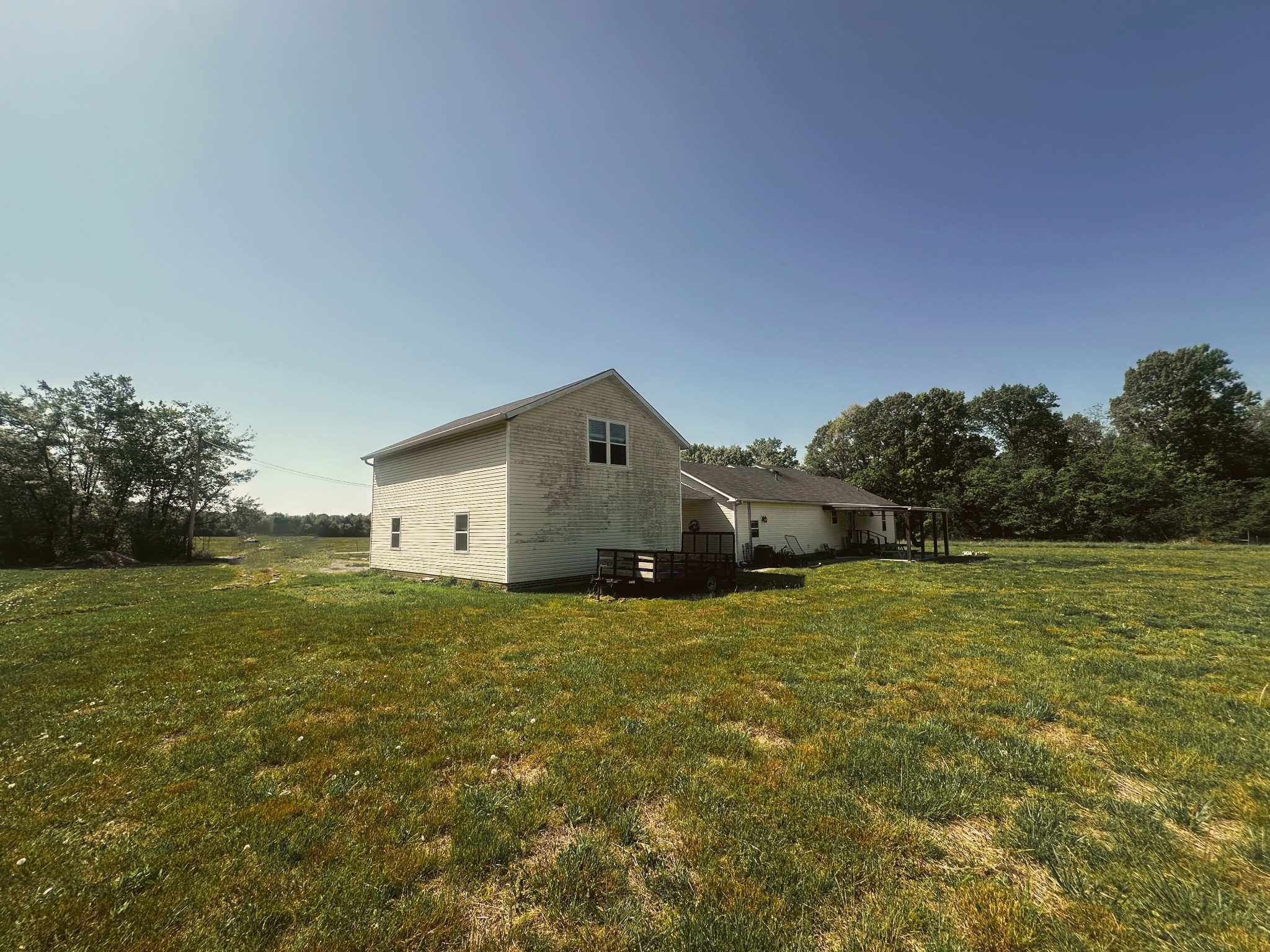 831 Philippi Road Wartrace, TN 37183 - Photo 12 of 51 a house with a field