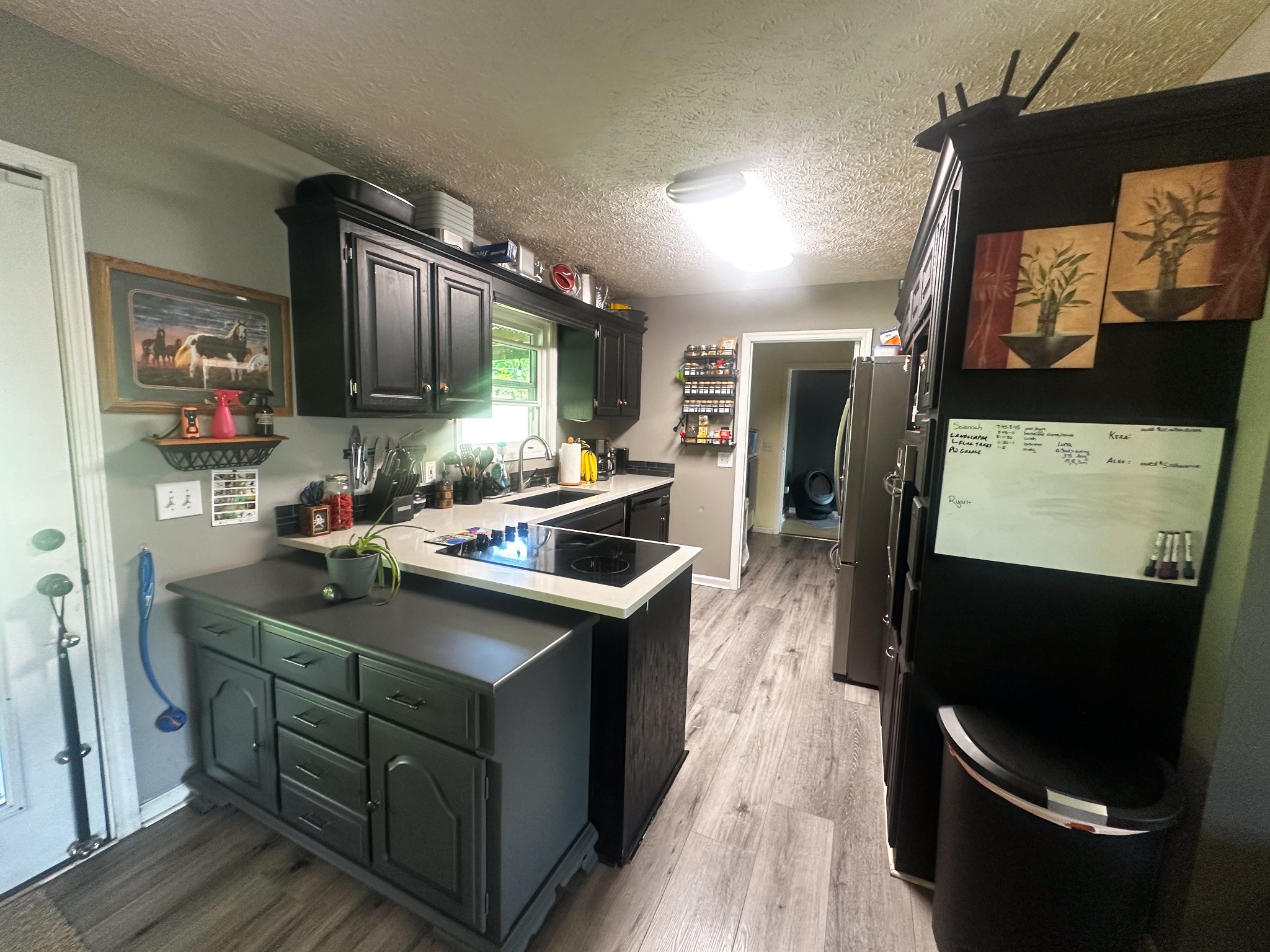 831 Philippi Road Wartrace, TN 37183 - Photo 23 of 51 a kitchen with stainless steel appliances granite countertop a sink stove and refrigerator