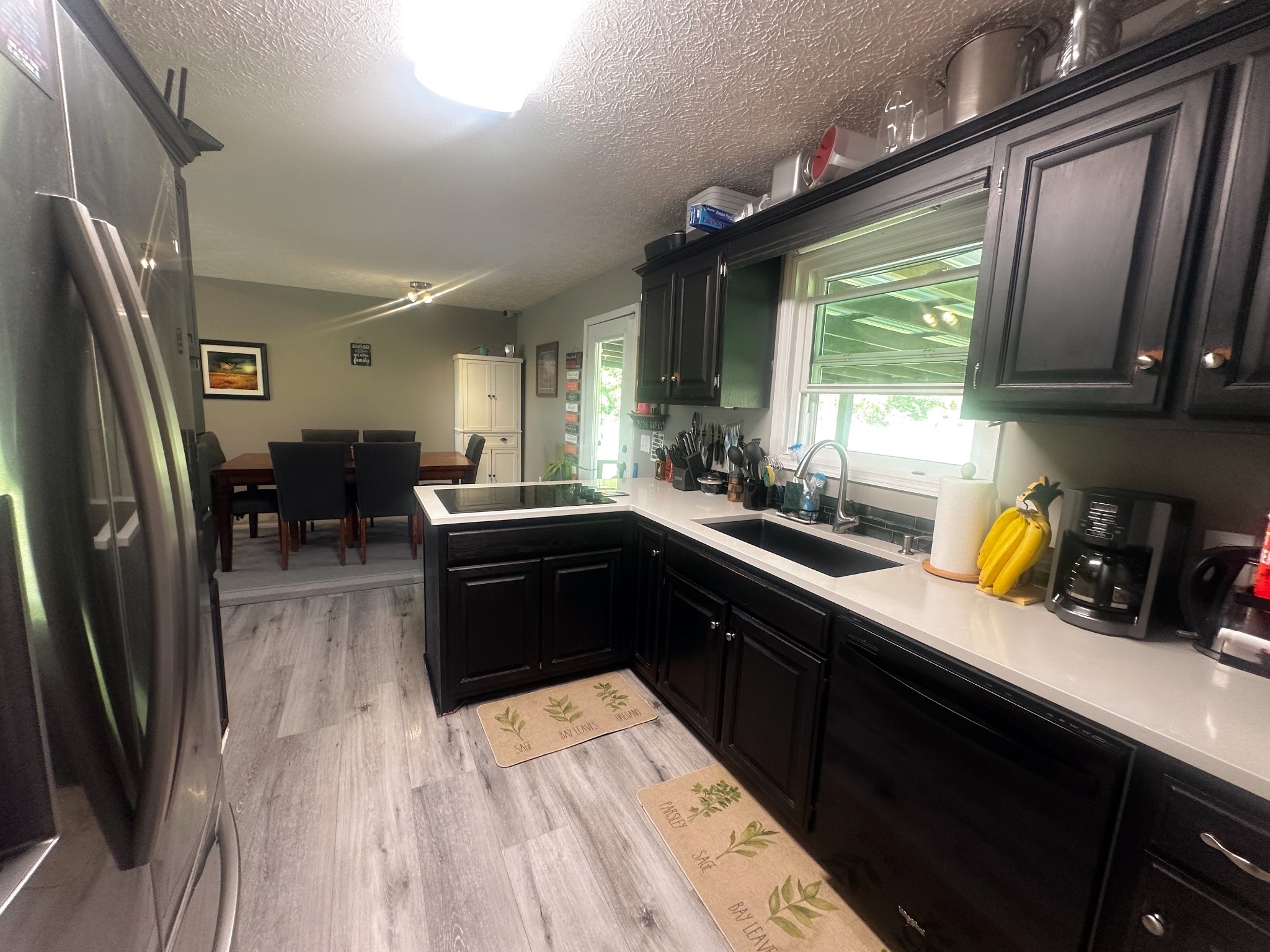 831 Philippi Road Wartrace, TN 37183 - Photo 24 of 51 a kitchen with stainless steel appliances a sink a stove and a refrigerator