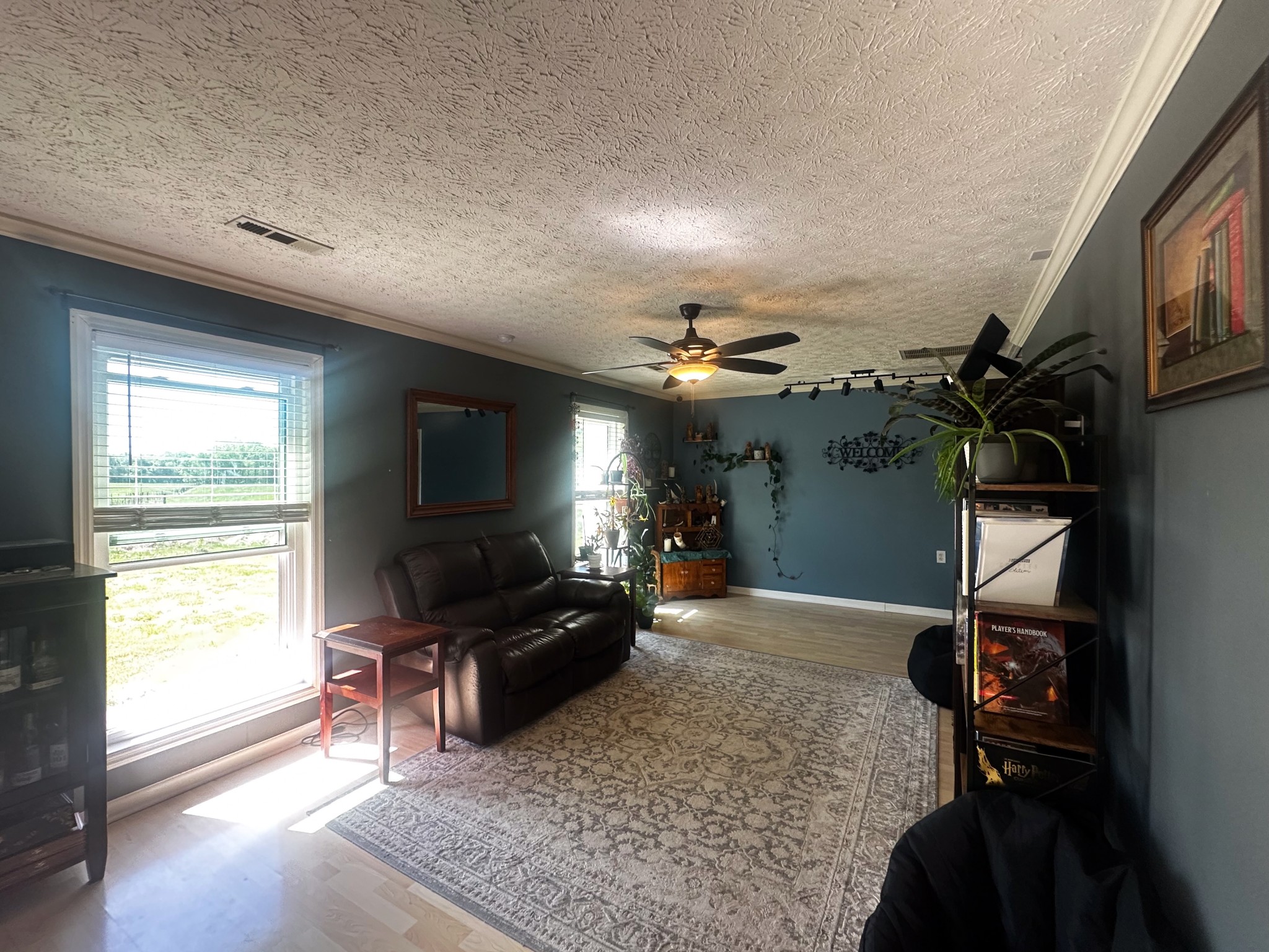 831 Philippi Road Wartrace, TN 37183 - Photo 29 of 51 a living room with furniture and a flat screen tv
