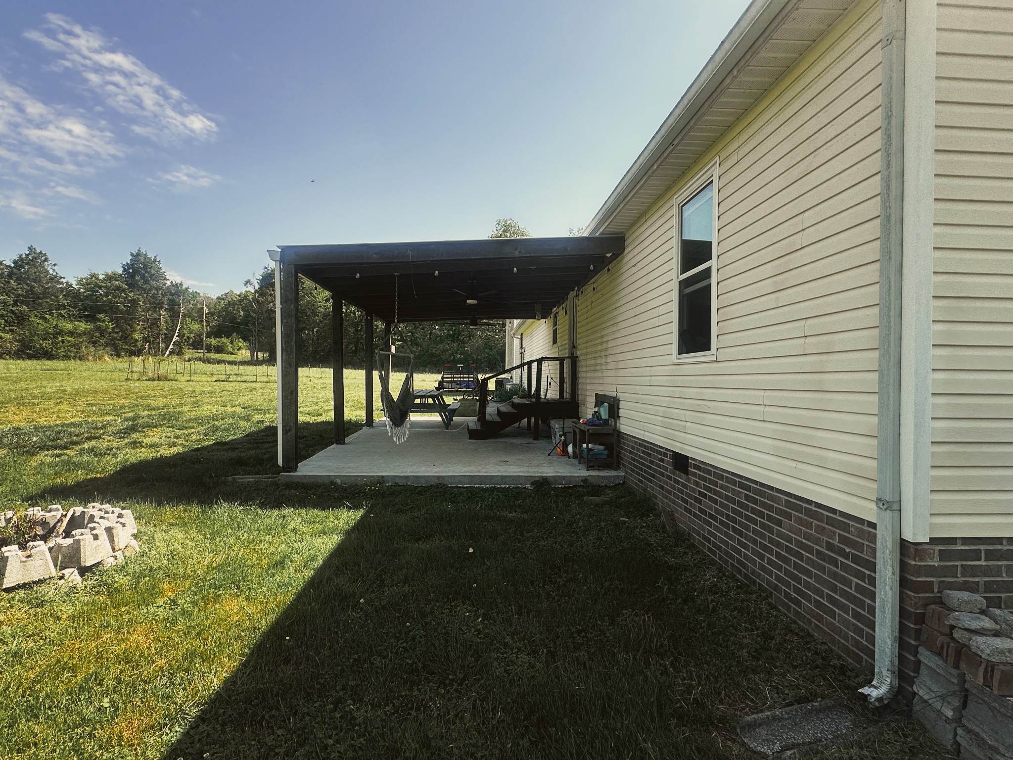 831 Philippi Road Wartrace, TN 37183 - Photo 6 of 51 a view of a backyard with sitting area