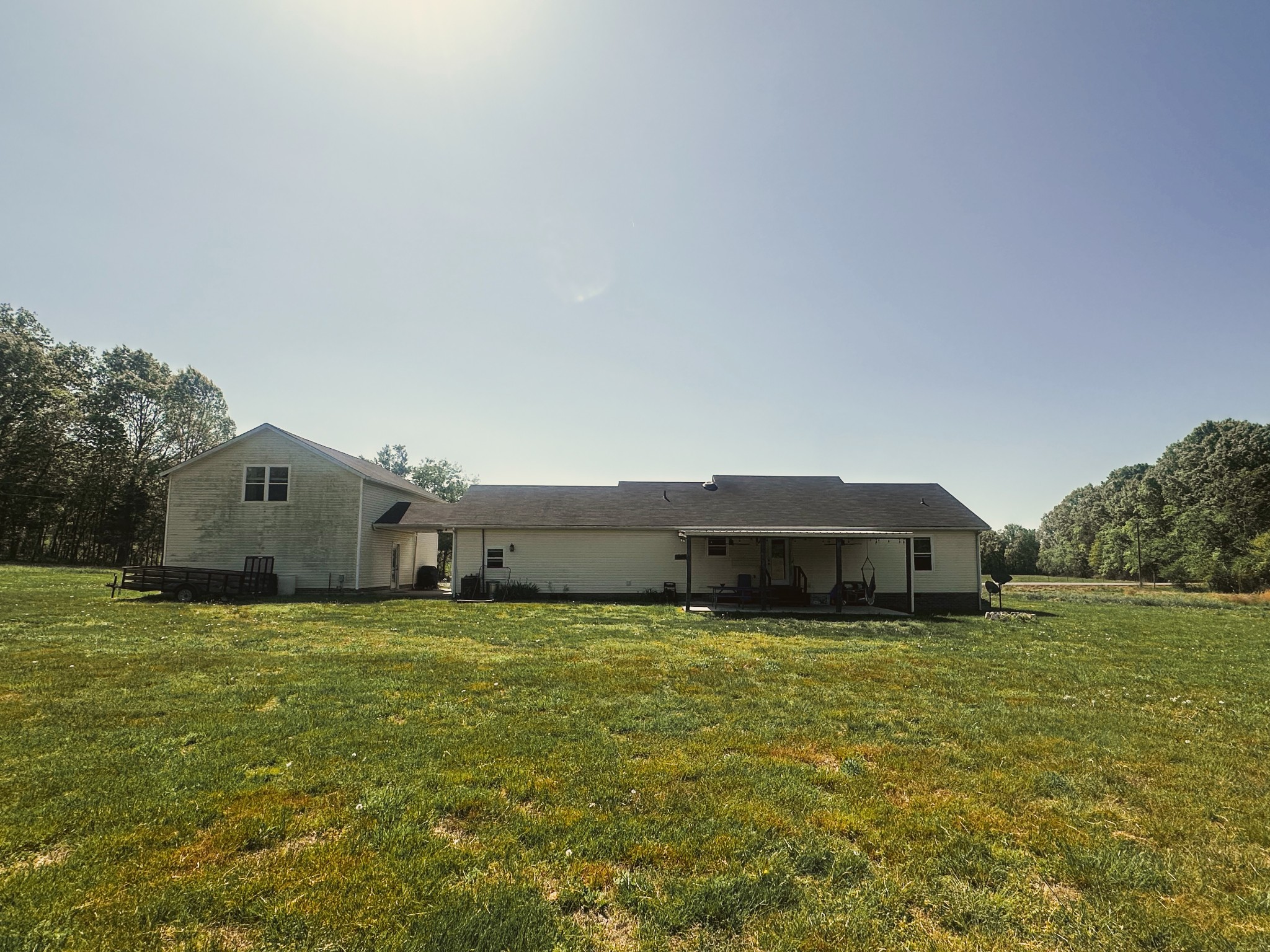 831 Philippi Road Wartrace, TN 37183 - Photo 8 of 51 a view of a large pool with lawn chairs and a large tree