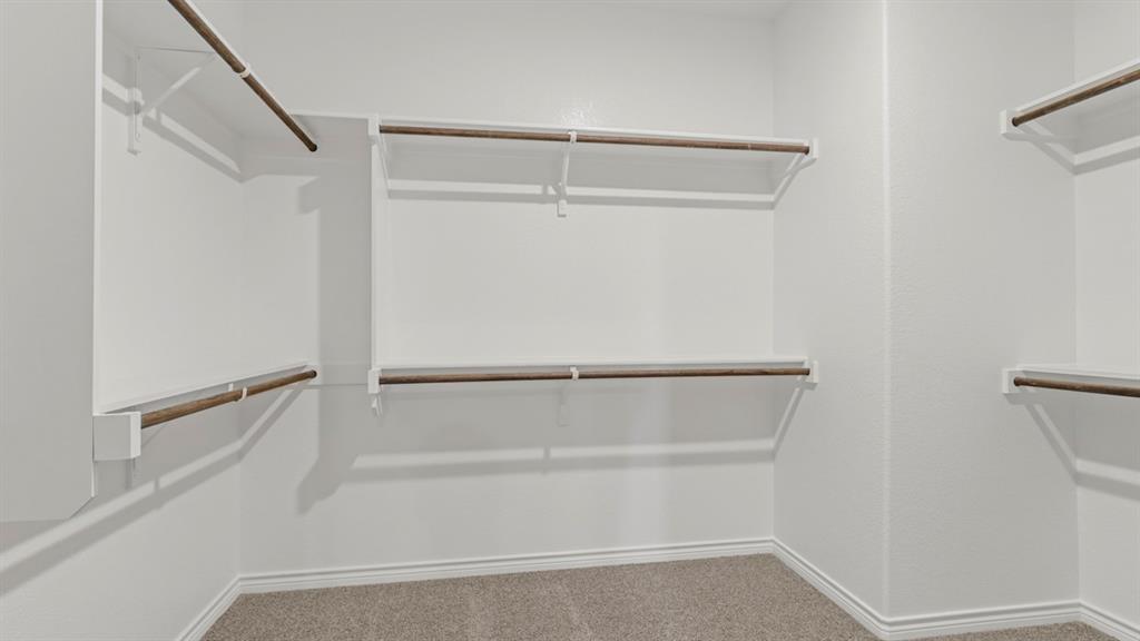 510 Range Road Caddo Mills, TX 75135 - Photo 12 of 25 a view of an empty walk in closet