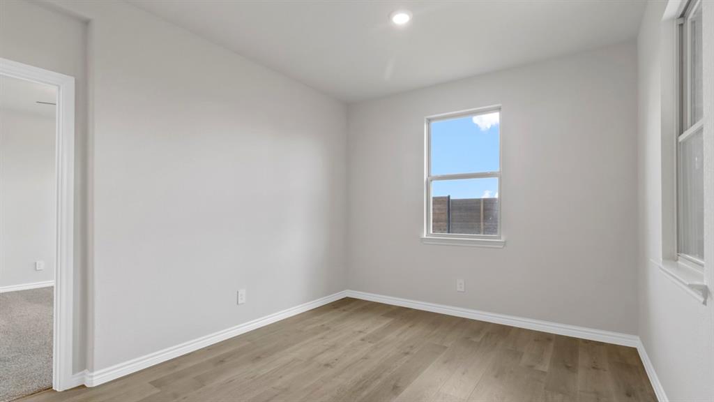 510 Range Road Caddo Mills, TX 75135 - Photo 13 of 25 an empty room with a window