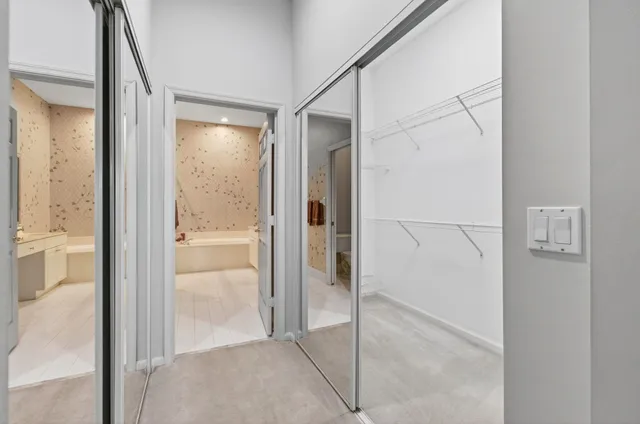 a view of a patio with table and chairs