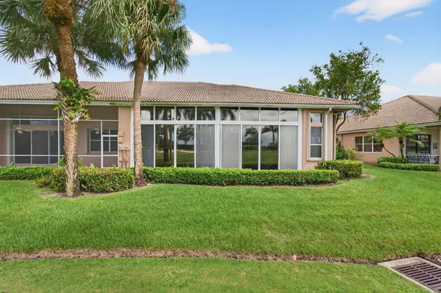 a view of a golf course with a lake