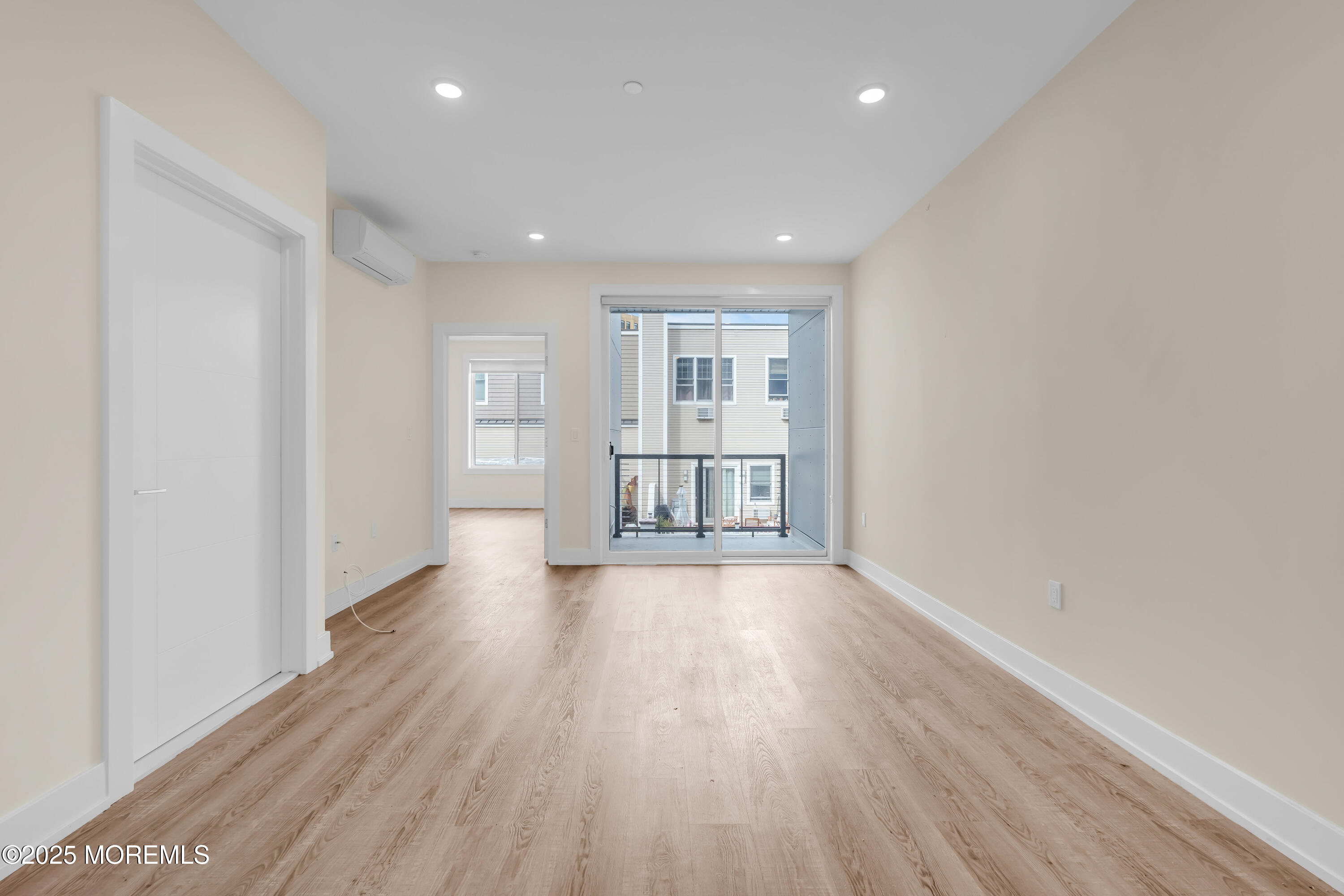 521 Lake Avenue, Unit 408 Asbury Park, NJ 07712 - Photo 15 of 30 a view of empty room with wooden floor