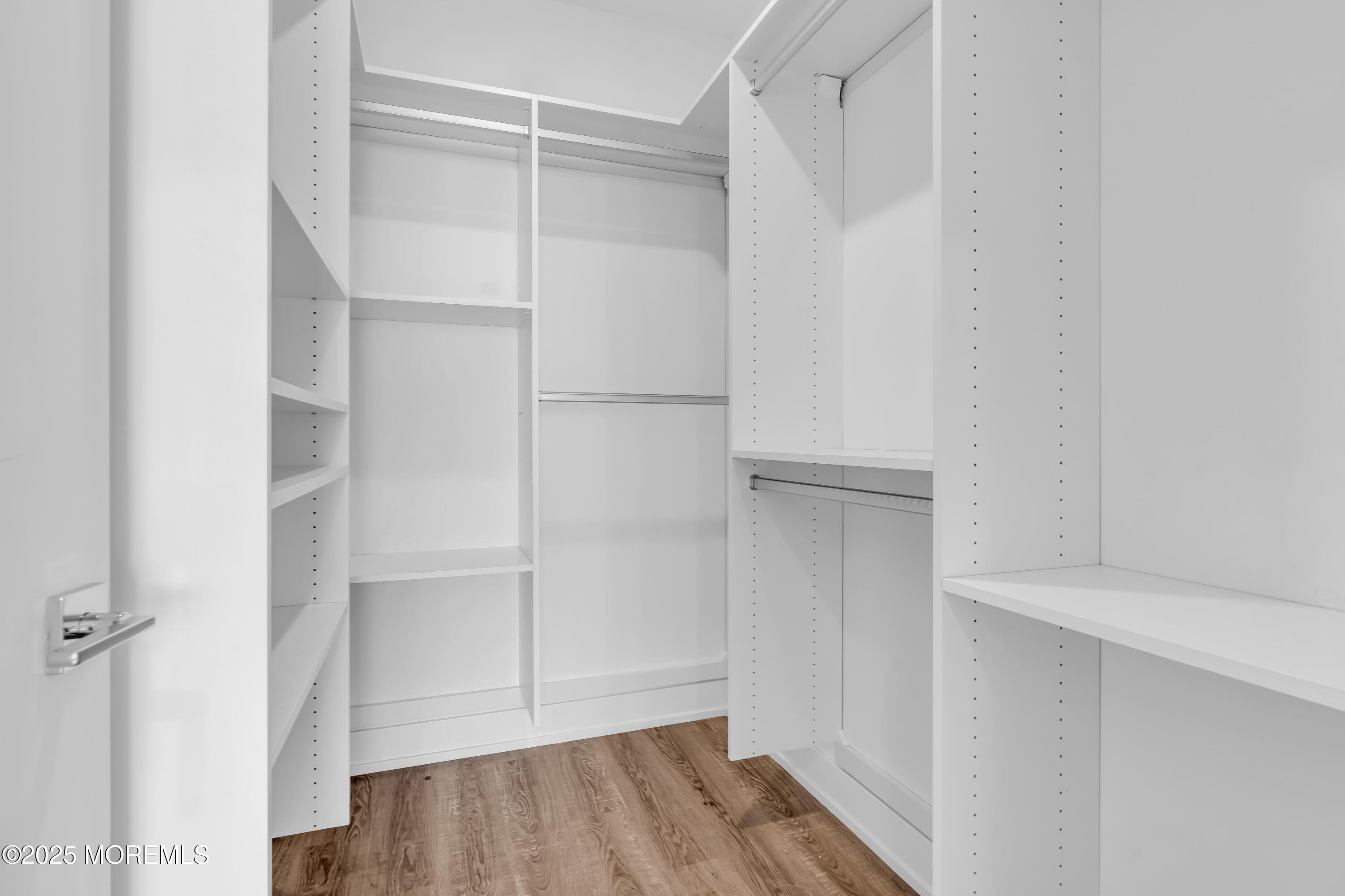 521 Lake Avenue, Unit 408 Asbury Park, NJ 07712 - Photo 21 of 30 a view of walk in closet with empty racks