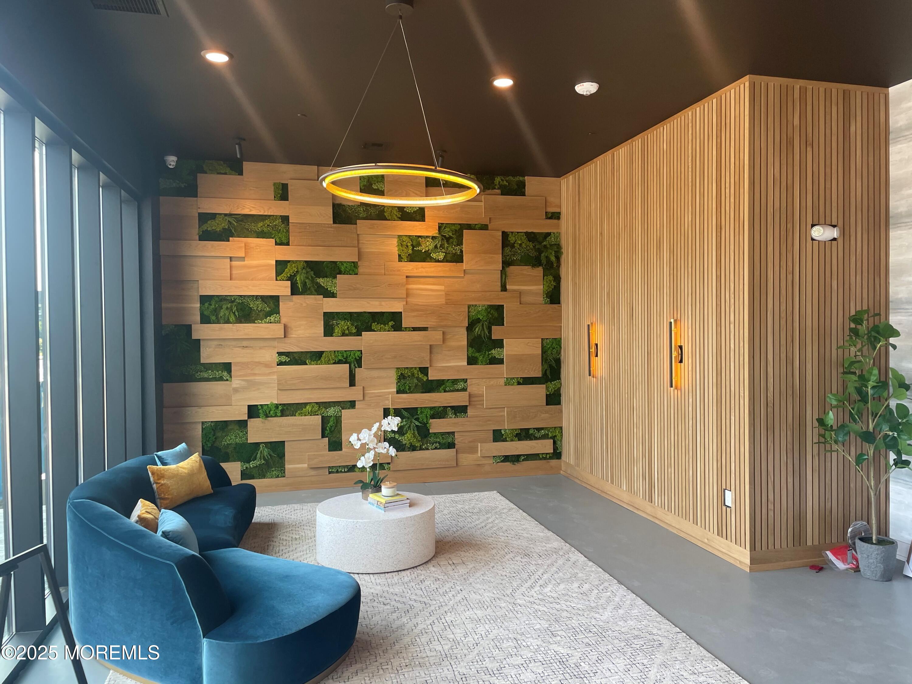 521 Lake Avenue, Unit 408 Asbury Park, NJ 07712 - Photo 28 of 30 a large room with table and chairs