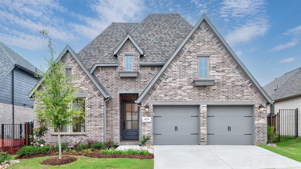 829 Stoney Bridge Way Lavon, TX 75166 - Photo 1 of 35 front view of a house with a yard
