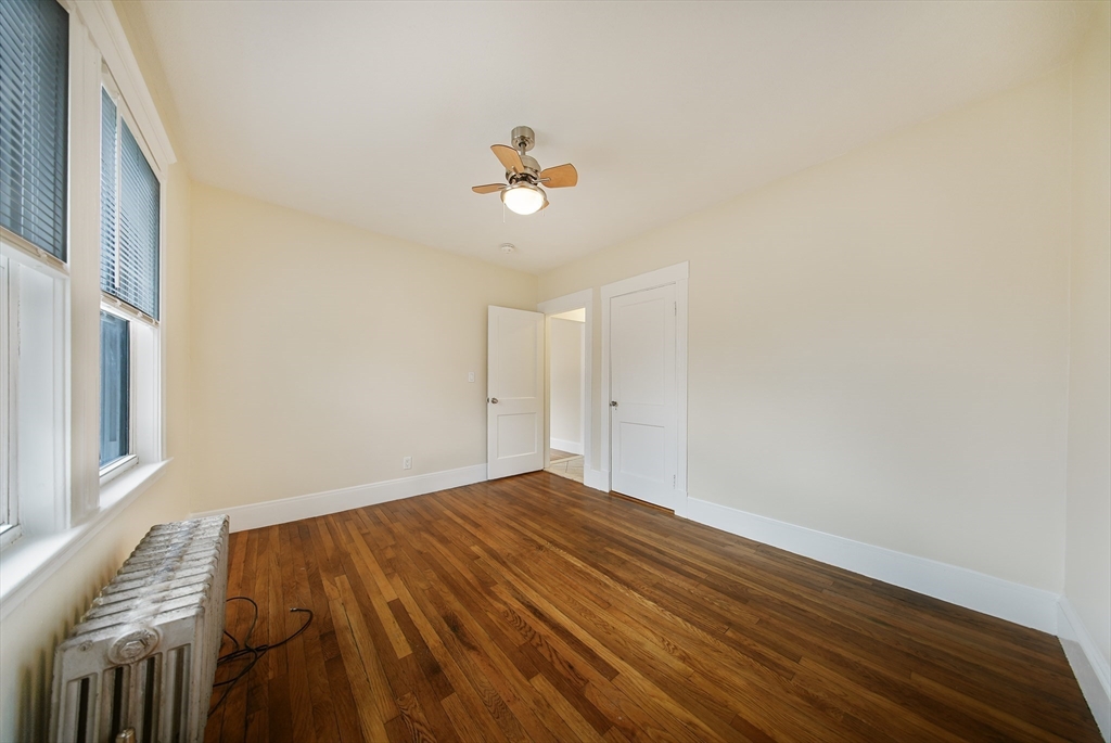 39 McDonald Street, Unit 39 Quincy, MA 02169 - Photo 12 of 15 a view of room with a ceiling fan