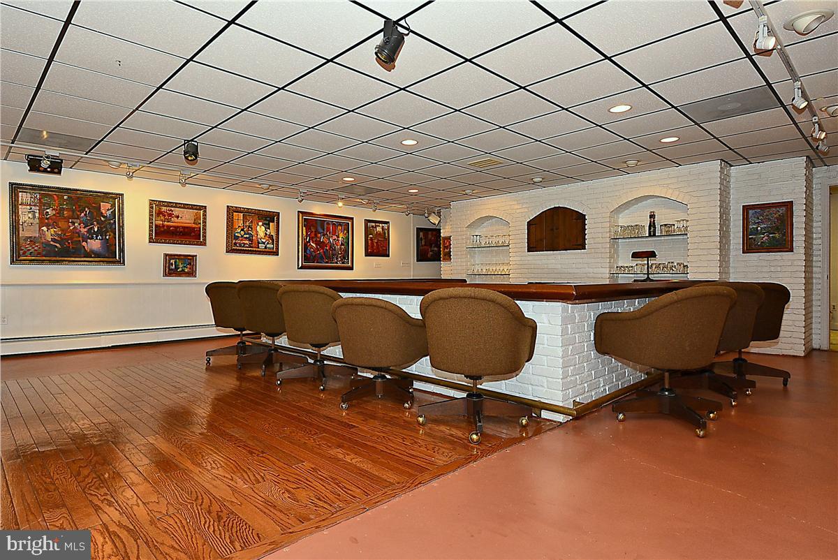 738 Intrepid Way Davidsonville, MD 21035 - Photo 15 of 71 a outdoor space with lots of furniture and wooden floor