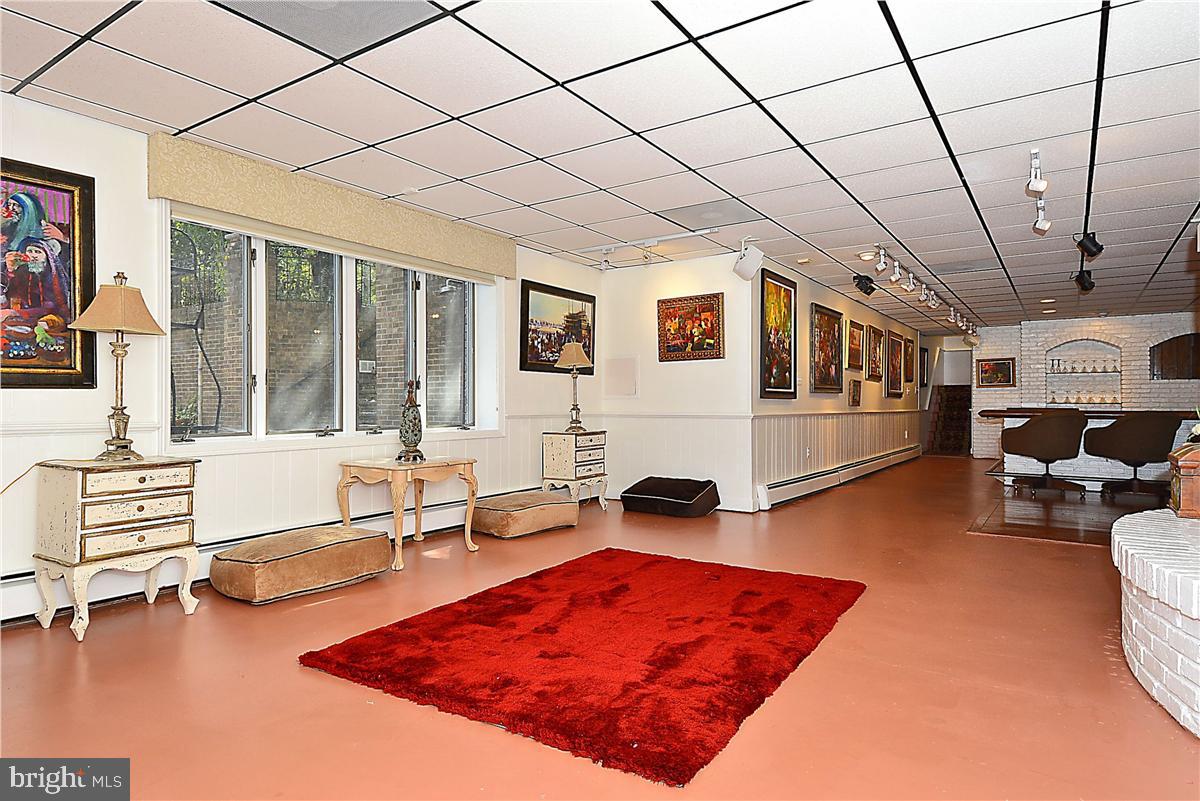738 Intrepid Way Davidsonville, MD 21035 - Photo 16 of 71 a living room with furniture pool table and blue walls