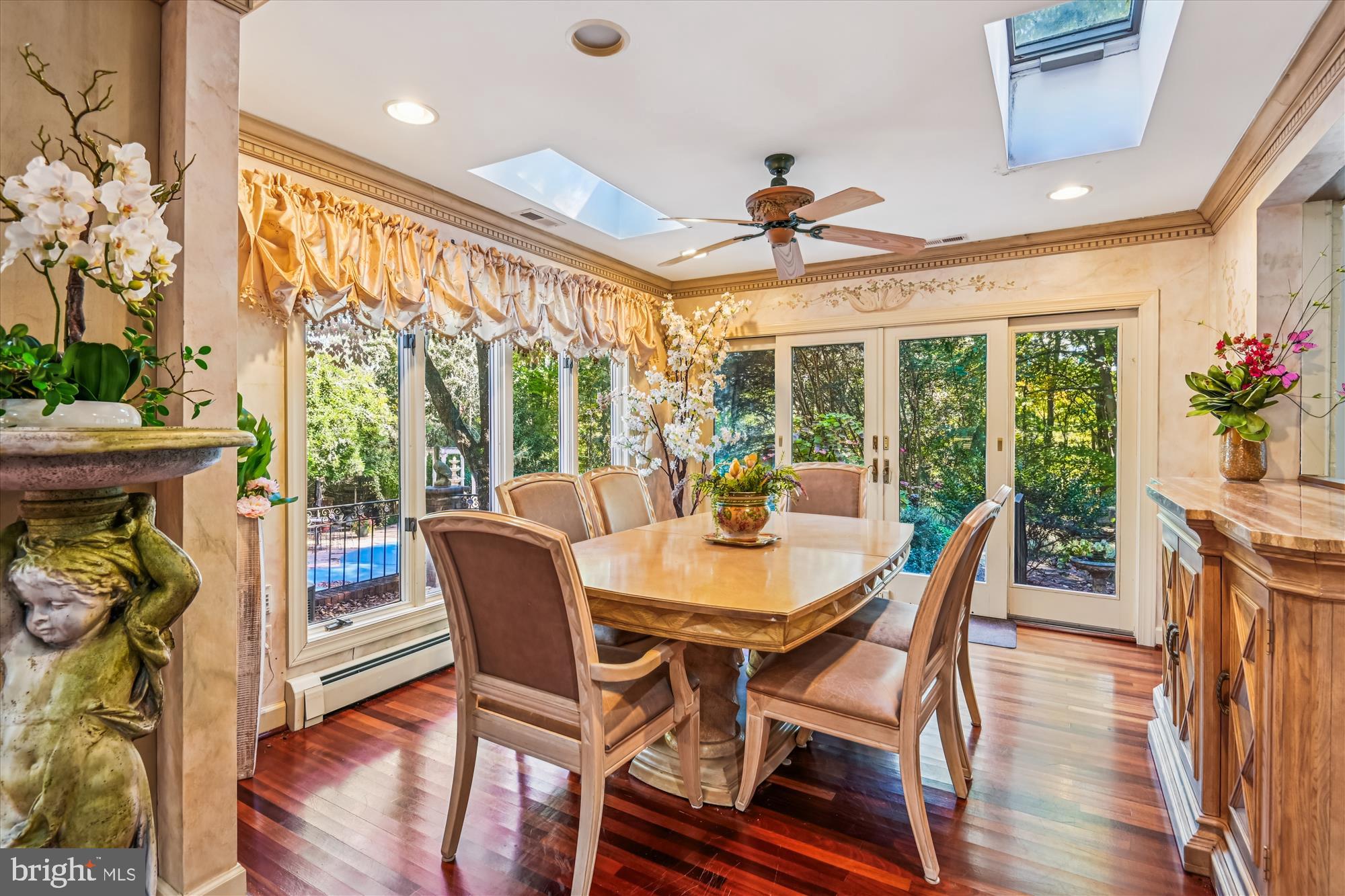 738 Intrepid Way Davidsonville, MD 21035 - Photo 19 of 71 a view of a dining room with furniture window and wooden floor