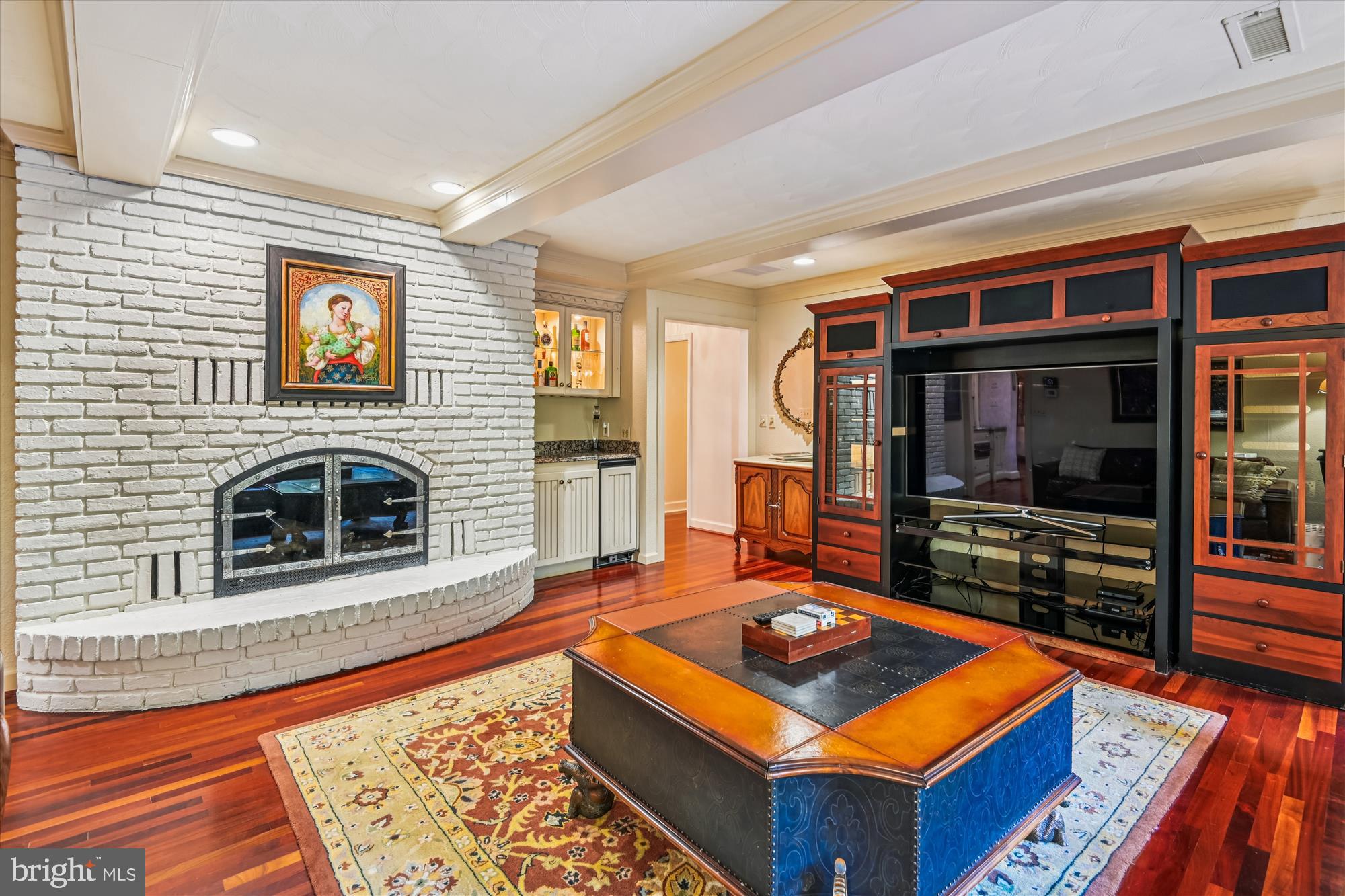 738 Intrepid Way Davidsonville, MD 21035 - Photo 22 of 71 a living room with furniture a flat screen tv and a fireplace