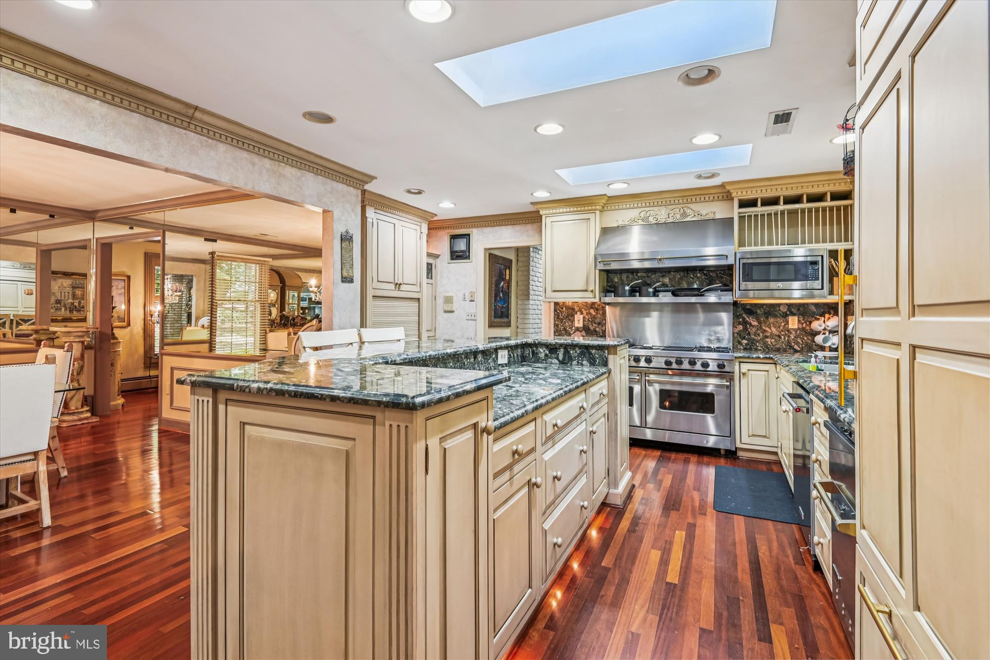 738 Intrepid Way Davidsonville, MD 21035 - Photo 28 of 71 a kitchen with stainless steel appliances granite countertop a stove and a refrigerator