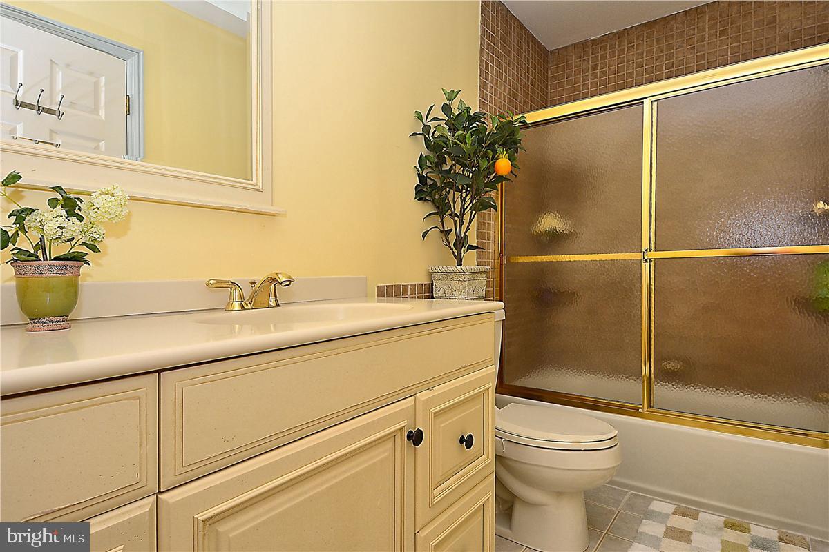 738 Intrepid Way Davidsonville, MD 21035 - Photo 9 of 71 a bathroom with a sink a toilet and shower