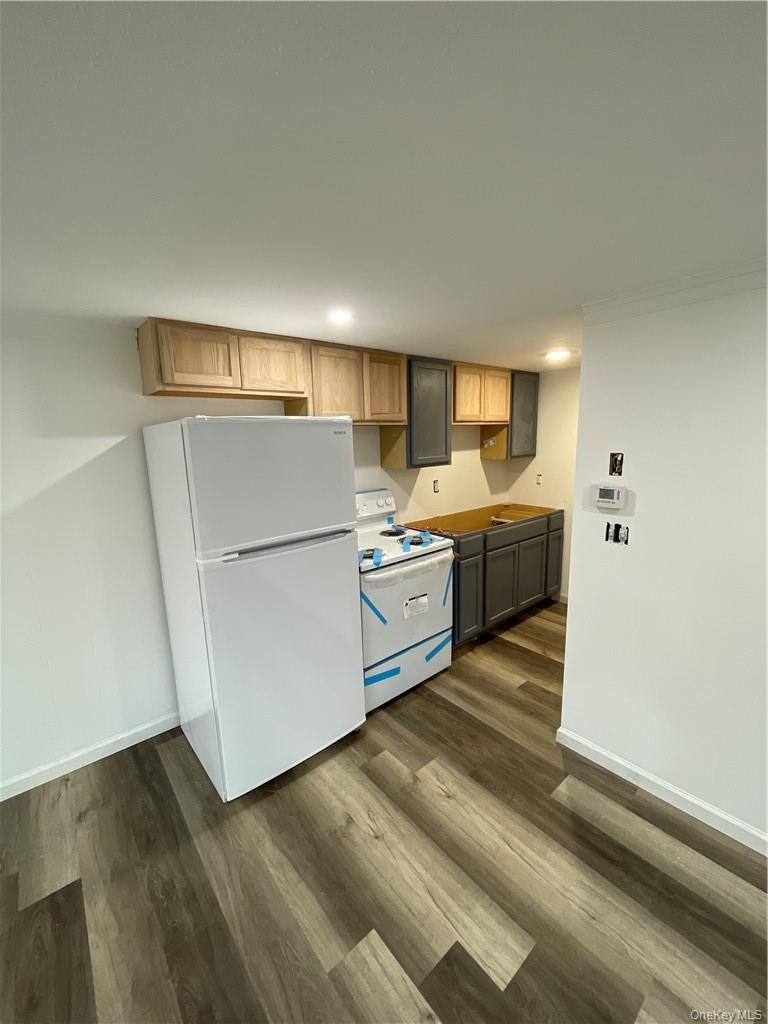 4927 State Rte 55 Swan Lake, NY 12783 - Photo 7 of 13 a kitchen with stainless steel appliances a refrigerator and a sink