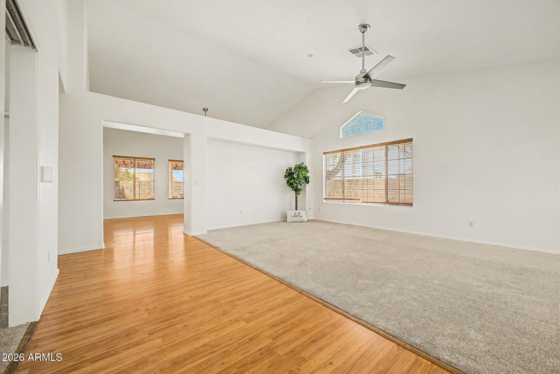 2762 North Ricardo Mesa, AZ 85215 - Photo 9 of 38 a view of empty room with wooden floor and fan