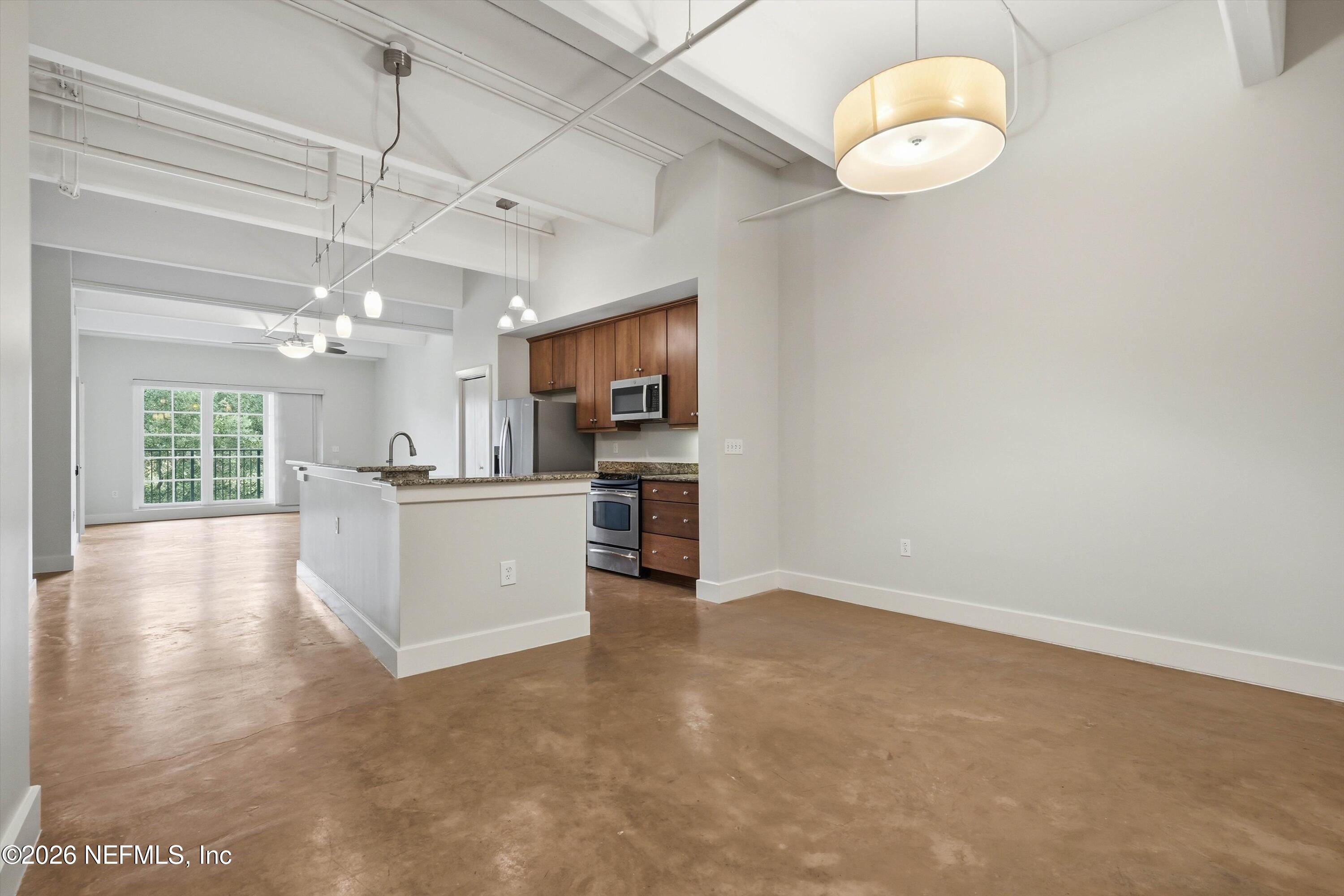 1661 Riverside Avenue, Unit 305 Jacksonville, FL 32204 - Photo 4 of 36 04-Dining to Kitchen