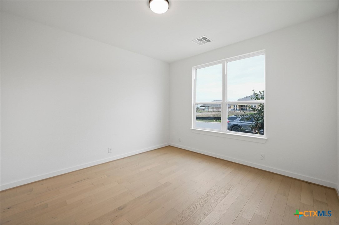 12213 Moon Pool Schertz, TX 78154 - Photo 16 of 25 an empty room with a window