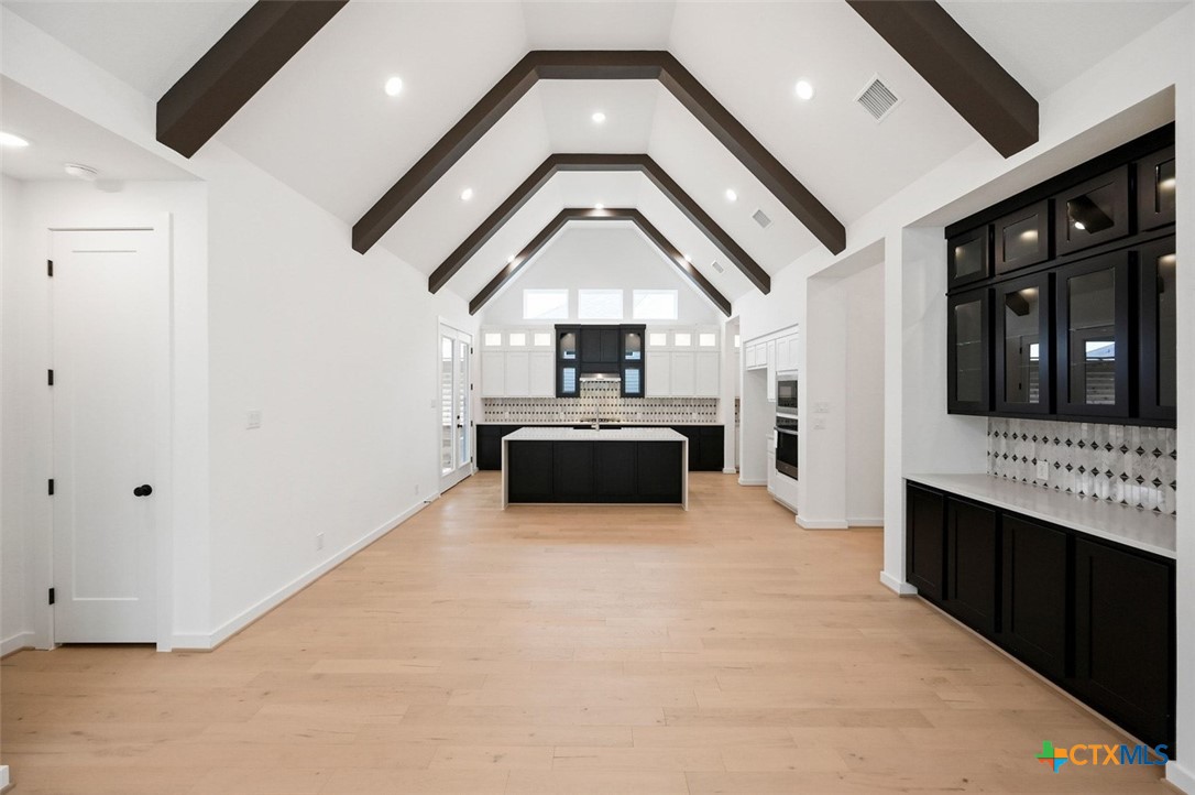 12213 Moon Pool Schertz, TX 78154 - Photo 21 of 25 a living room with a couch and a ceiling fan