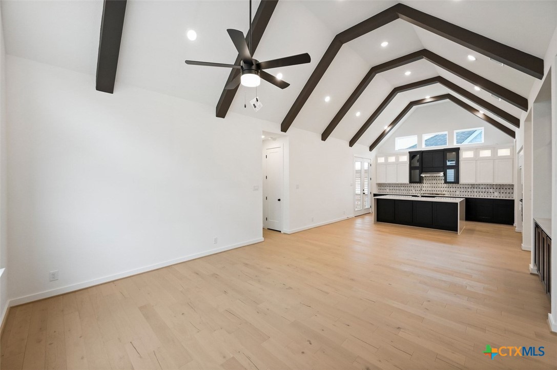 12213 Moon Pool Schertz, TX 78154 - Photo 8 of 25 a view of a living room with a ceiling fan