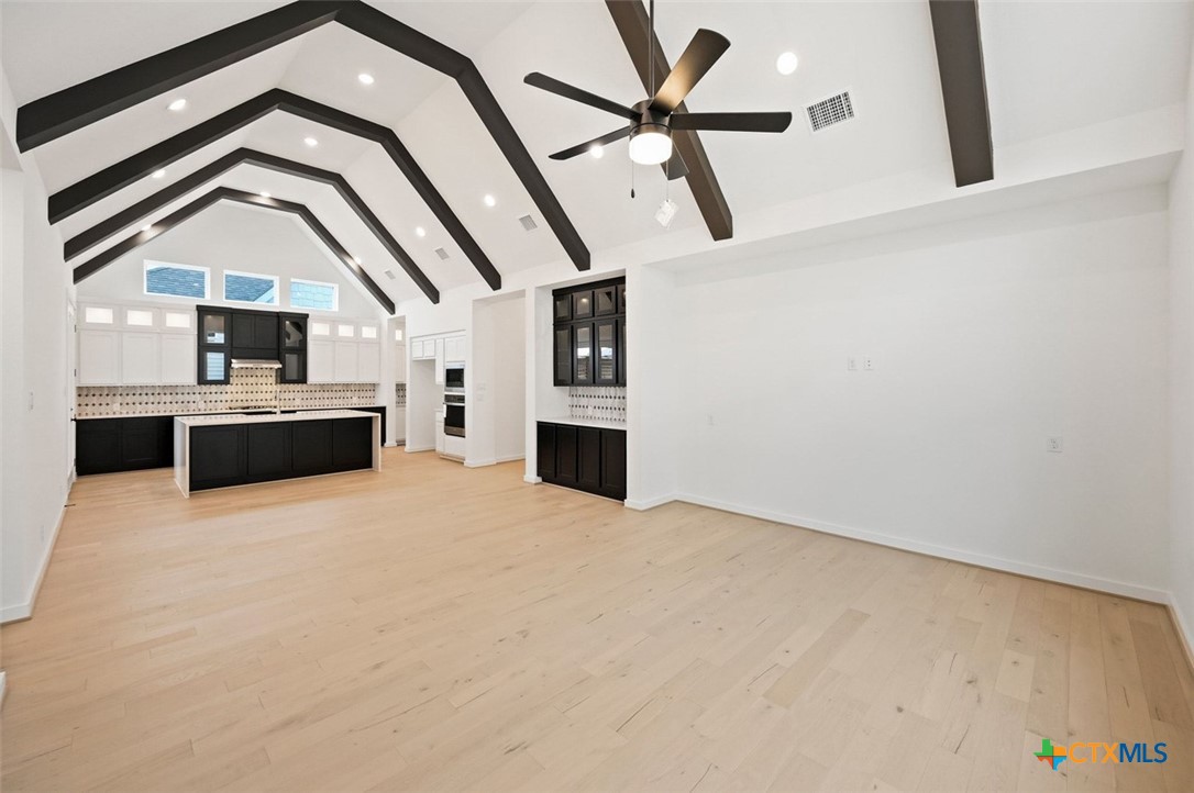 12213 Moon Pool Schertz, TX 78154 - Photo 9 of 25 a view of a livingroom with a ceiling fan
