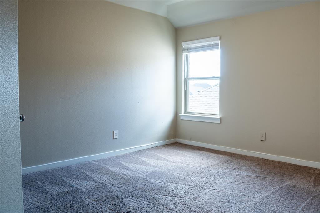 348 Braves Way Lavon, TX 75166 - Photo 18 of 29 an empty room with a window