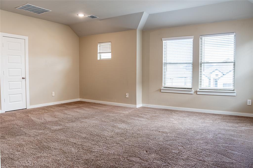 348 Braves Way Lavon, TX 75166 - Photo 19 of 29 an empty room with windows