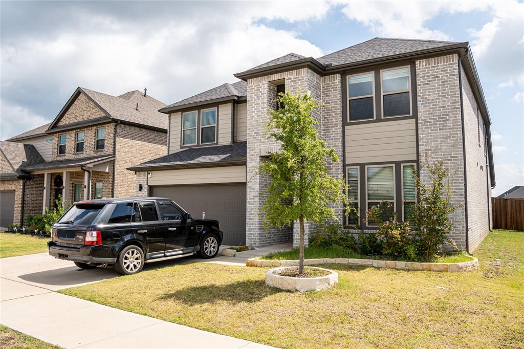 348 Braves Way Lavon, TX 75166 - Photo 3 of 29 a car parked in front of a house