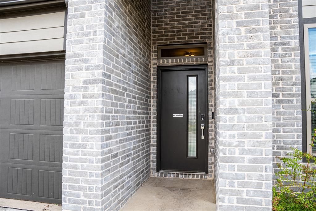 348 Braves Way Lavon, TX 75166 - Photo 4 of 29 a view of a door of the house