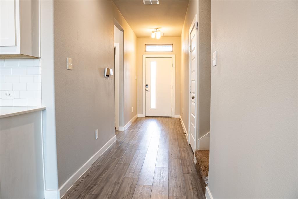 348 Braves Way Lavon, TX 75166 - Photo 5 of 29 a view of gallery with wooden floor