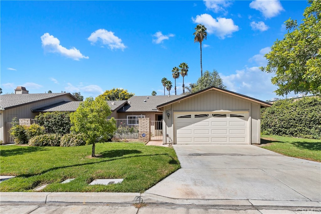 2677 Laramie Road Riverside, CA 92506 - Photo 1 of 1 a front view of a house with a yard