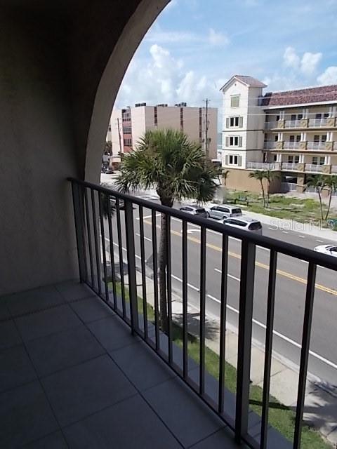 14001 Gulf Boulevard, Unit 407 Madeira Beach, FL 33708 - Photo 13 of 39 a view of building from balcony