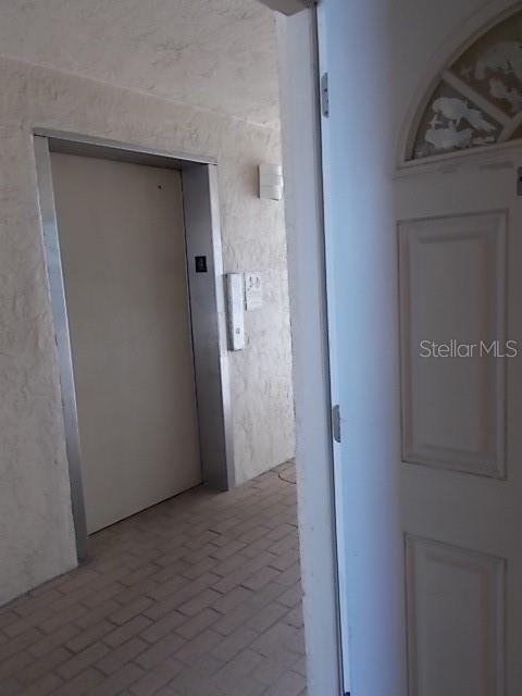 14001 Gulf Boulevard, Unit 407 Madeira Beach, FL 33708 - Photo 29 of 39 a view of a hallway