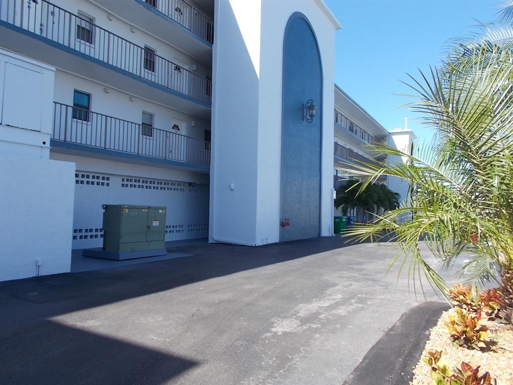 14001 Gulf Boulevard, Unit 407 Madeira Beach, FL 33708 - Photo 30 of 39 a view of livingroom with furniture and a fireplace
