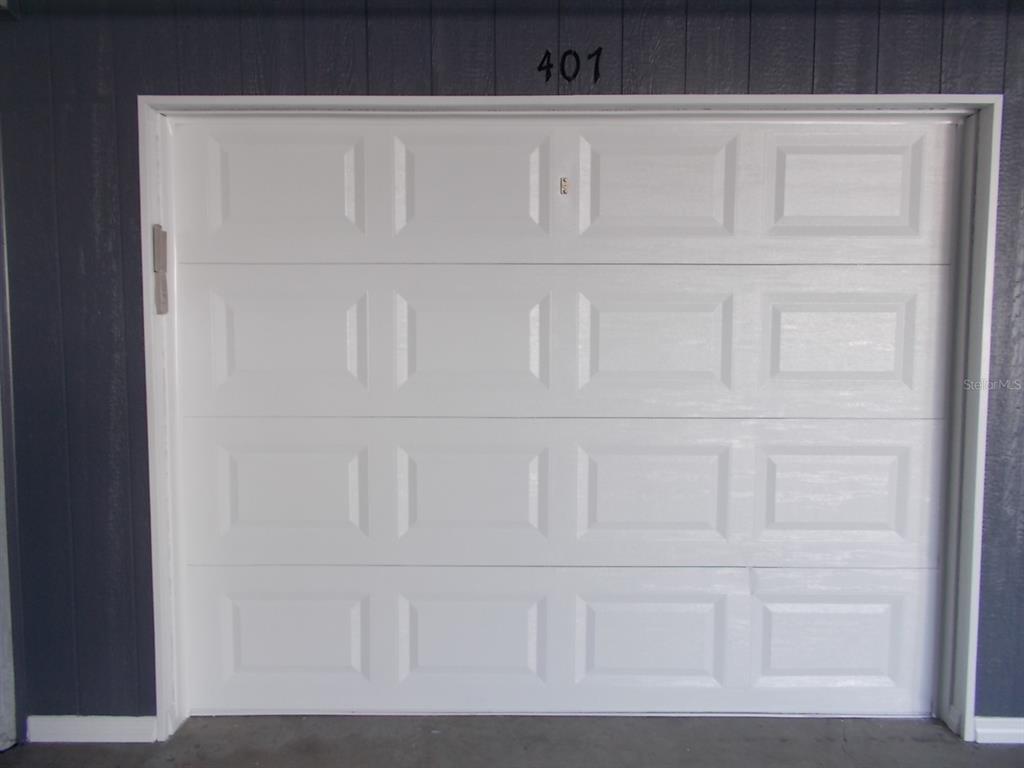 14001 Gulf Boulevard, Unit 407 Madeira Beach, FL 33708 - Photo 32 of 39 a view of white cabinet