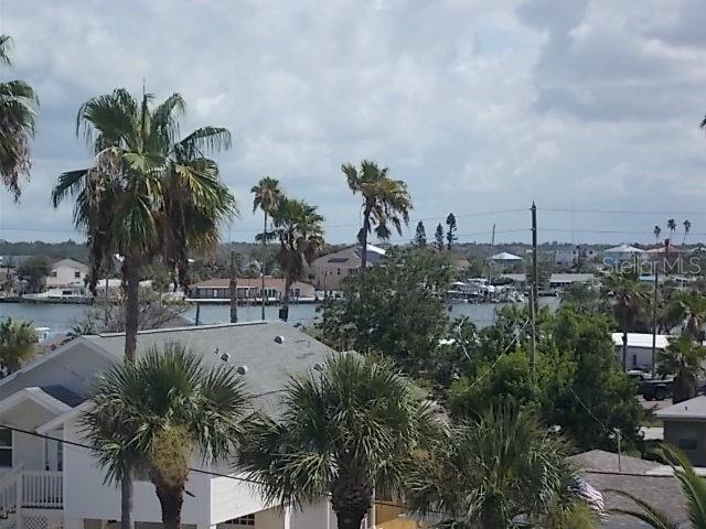 14001 Gulf Boulevard, Unit 407 Madeira Beach, FL 33708 - Photo 37 of 39 a view of a city and lake view