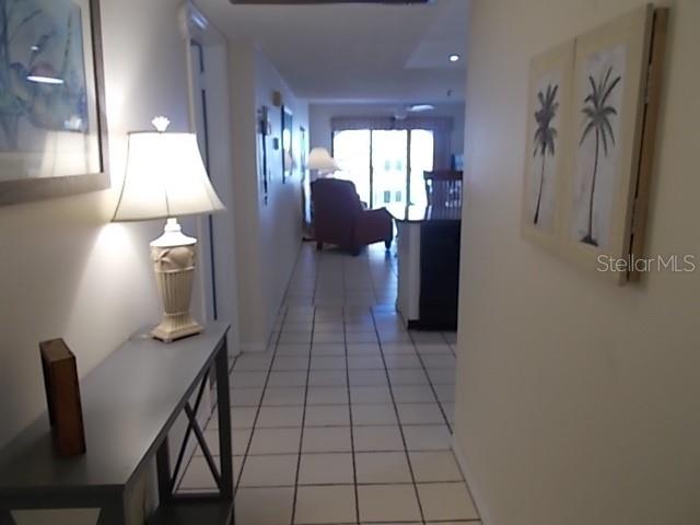 14001 Gulf Boulevard, Unit 407 Madeira Beach, FL 33708 - Photo 5 of 39 a view of a hallway with seating area