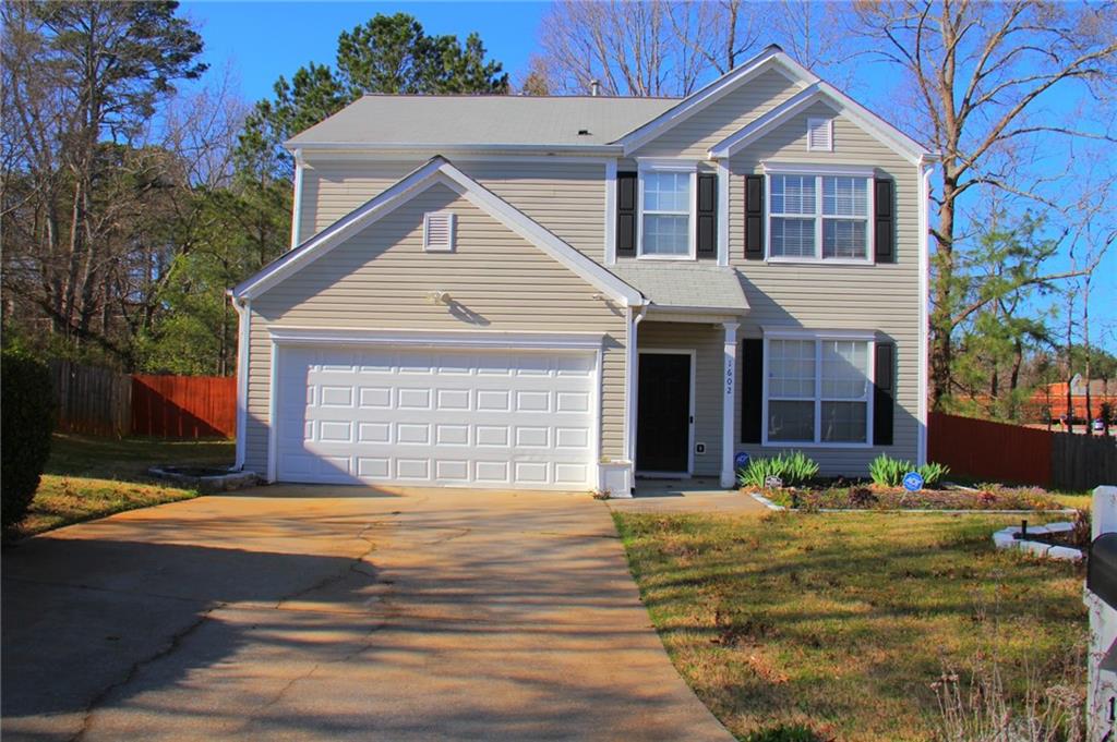1602 Silver Oak Drive Austell, GA 30106 - Photo 1 of 1 a front view of a house with a yard