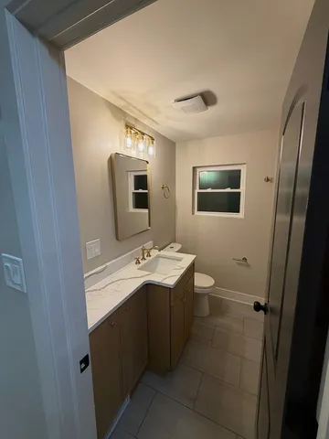 a view of bathroom with dual sinks