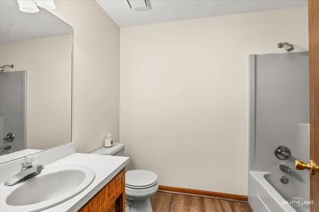 a bathroom with a sink and a toilet