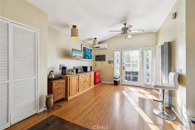 a bathroom with a granite countertop shower and a sink