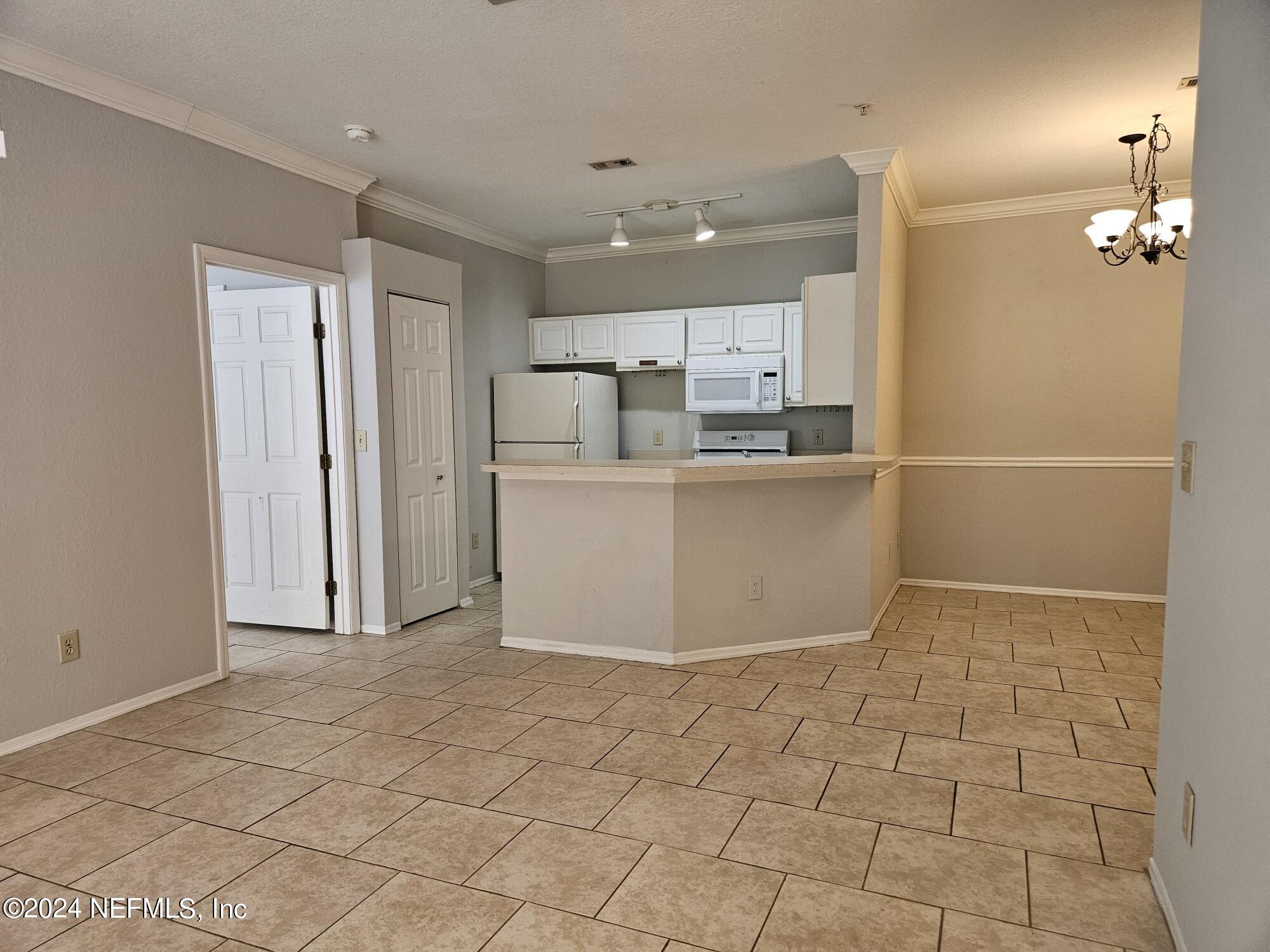 13810 Sutton Park Drive North, Unit 916 Jacksonville, FL 32224 - Photo 17 of 17 a view of a kitchen with a sink