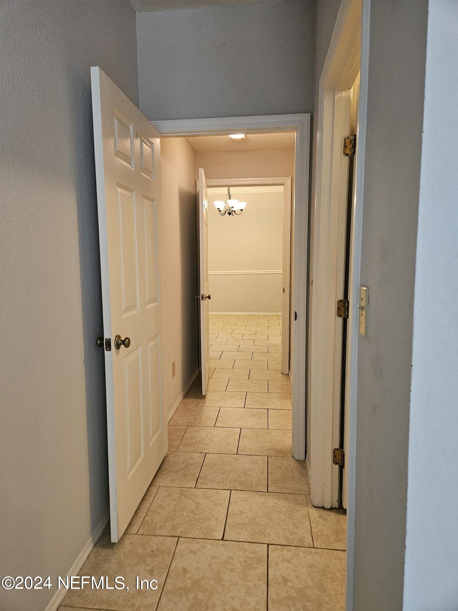 13810 Sutton Park Drive North, Unit 916 Jacksonville, FL 32224 - Photo 7 of 17 a bathroom with a shower and a glass door