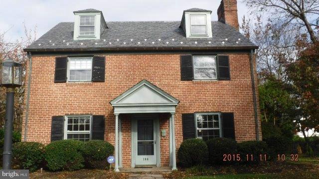 104 Croydon Road Baltimore, MD 21212 - Photo 1 of 13 a front view of a house with a garden