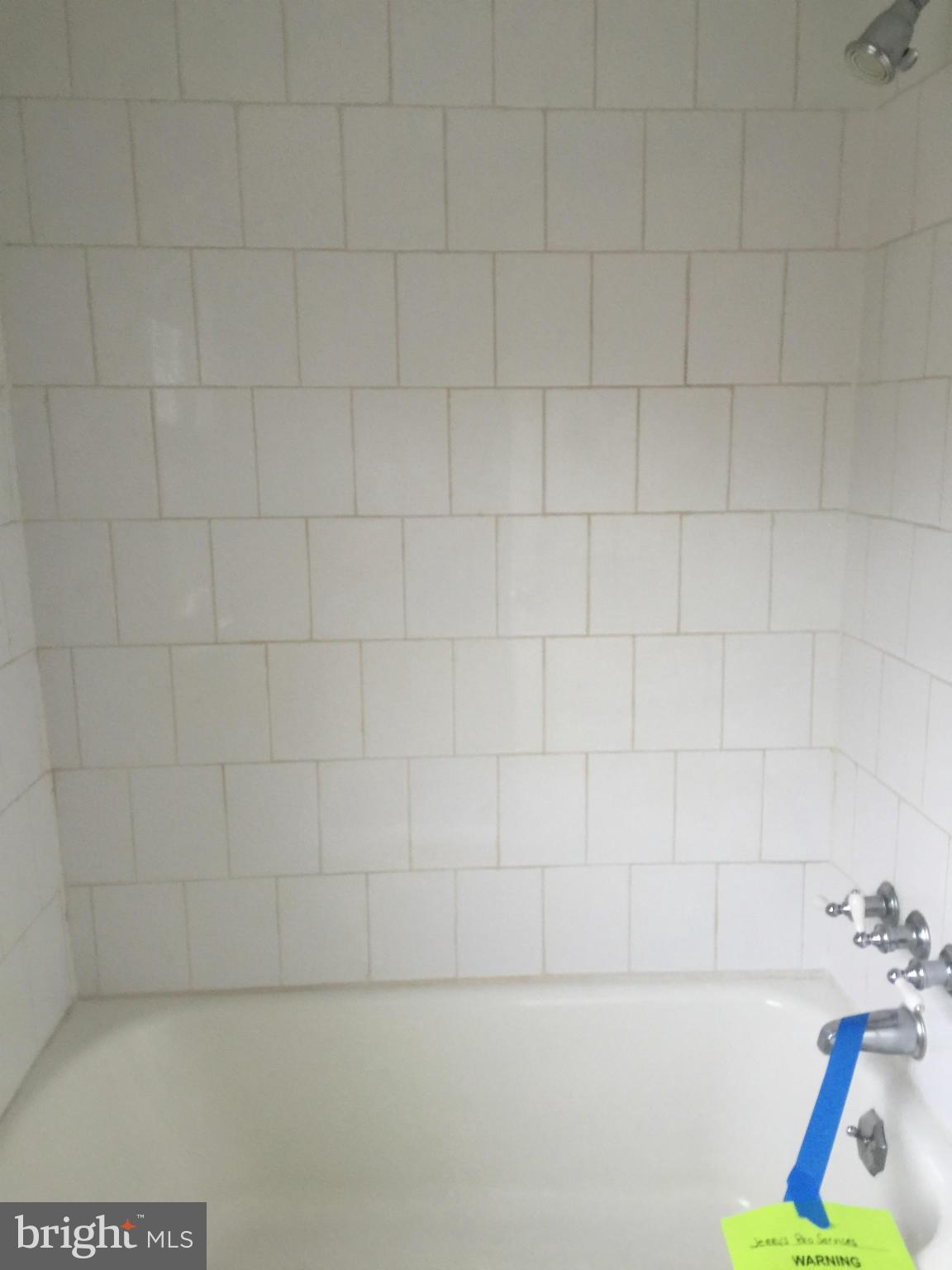 104 Croydon Road Baltimore, MD 21212 - Photo 11 of 13 a bathroom with a bathtub
